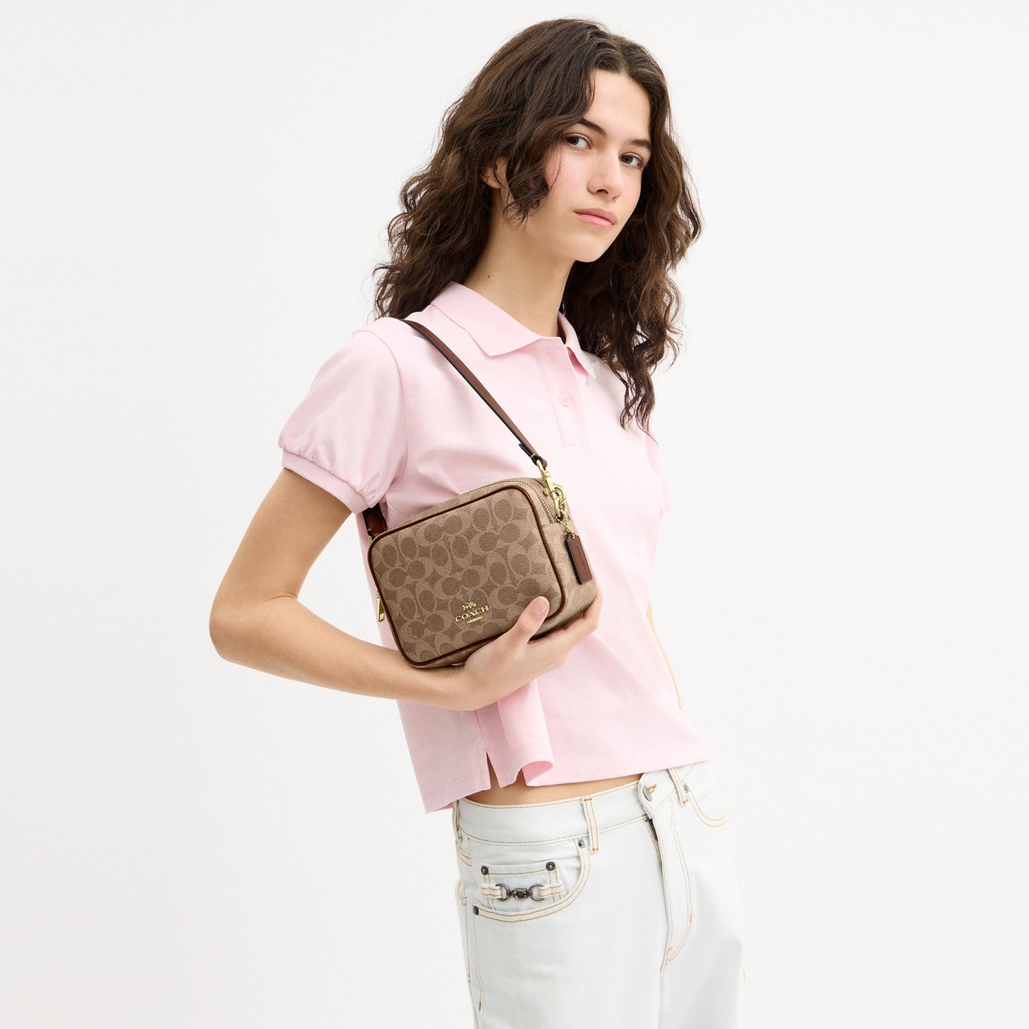 Mini Carey Crossbody Bag In Signature Canvas