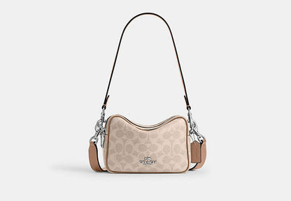 Mini Carey Crossbody Bag In Signature Canvas