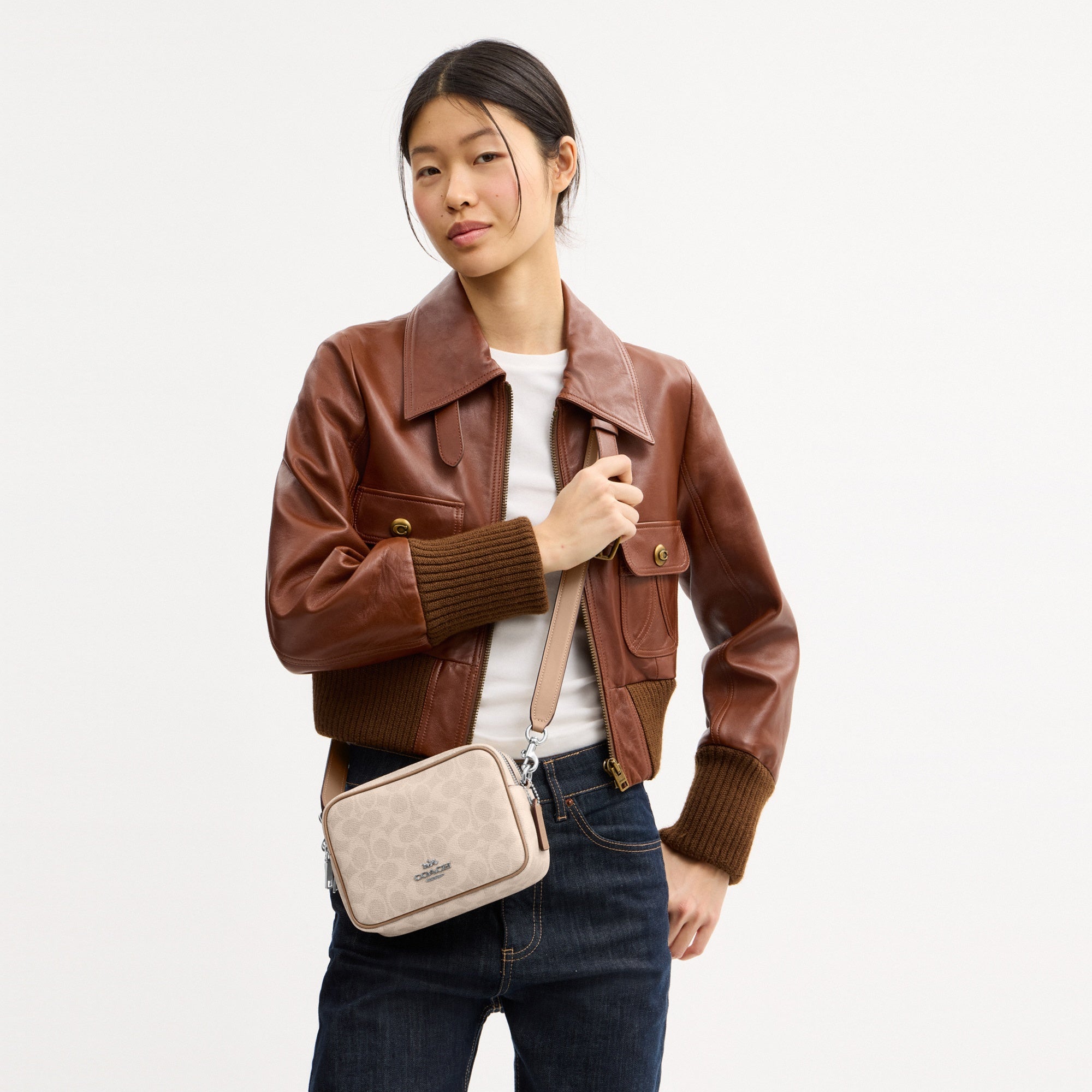 Mini Carey Crossbody Bag In Signature Canvas