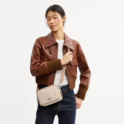 Mini Carey Crossbody Bag In Signature Canvas
