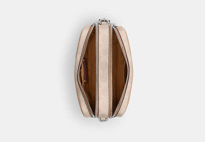 Mini Carey Crossbody Bag In Signature Canvas