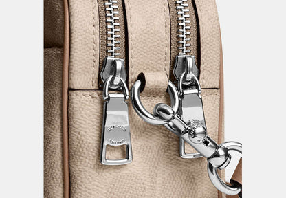 Mini Carey Crossbody Bag In Signature Canvas