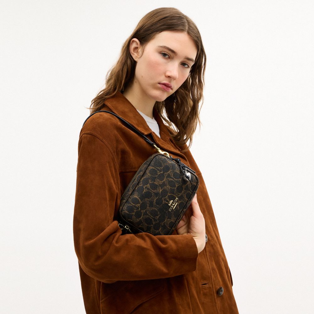 Mini Carey Crossbody Bag In Loved Signature Canvas