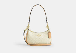 Teri Mini Crossbody Bag In Signature Leather