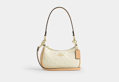Teri Mini Crossbody Bag In Signature Leather