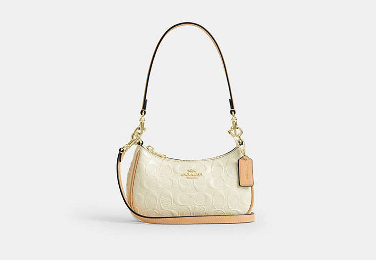 Teri Mini Crossbody Bag In Signature Leather