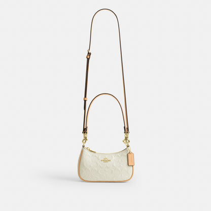 Teri Mini Crossbody Bag In Signature Leather