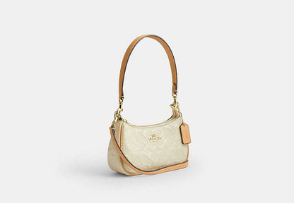 Teri Mini Crossbody Bag In Signature Leather