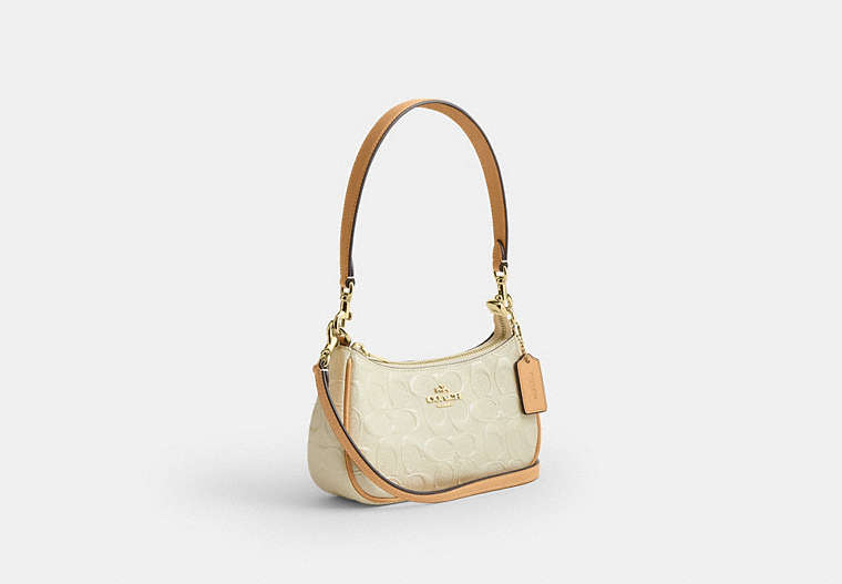 Teri Mini Crossbody Bag In Signature Leather