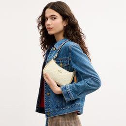 Teri Mini Crossbody Bag In Signature Leather