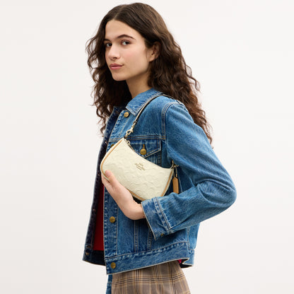 Teri Mini Crossbody Bag In Signature Leather