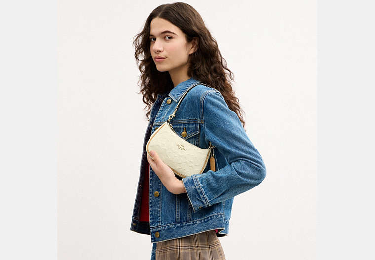 Teri Mini Crossbody Bag In Signature Leather