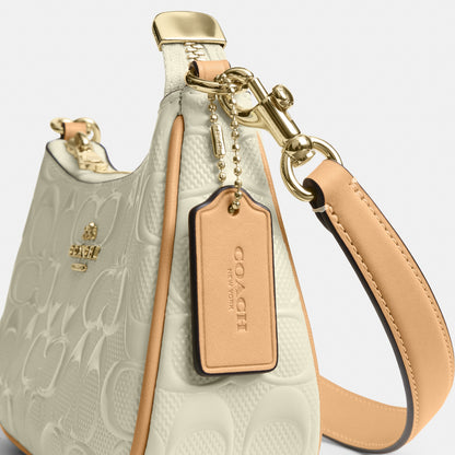 Teri Mini Crossbody Bag In Signature Leather