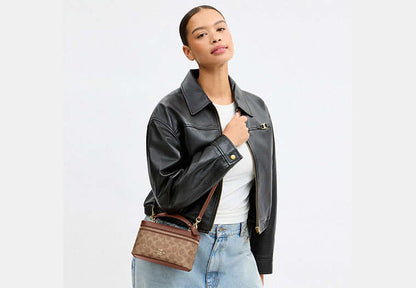 Rainer Crossbody Bag 18 In Signature Canvas