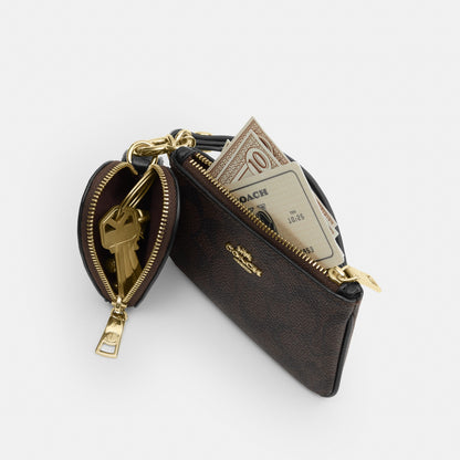 Wristlet And Heart Pouch In Signature Canvas With Charm