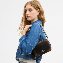 Mini Carey Crossbody Bag In Loved Leather