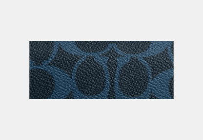 Colton Crossbody Bag 19 In Signature Canvas With Coach Graphic