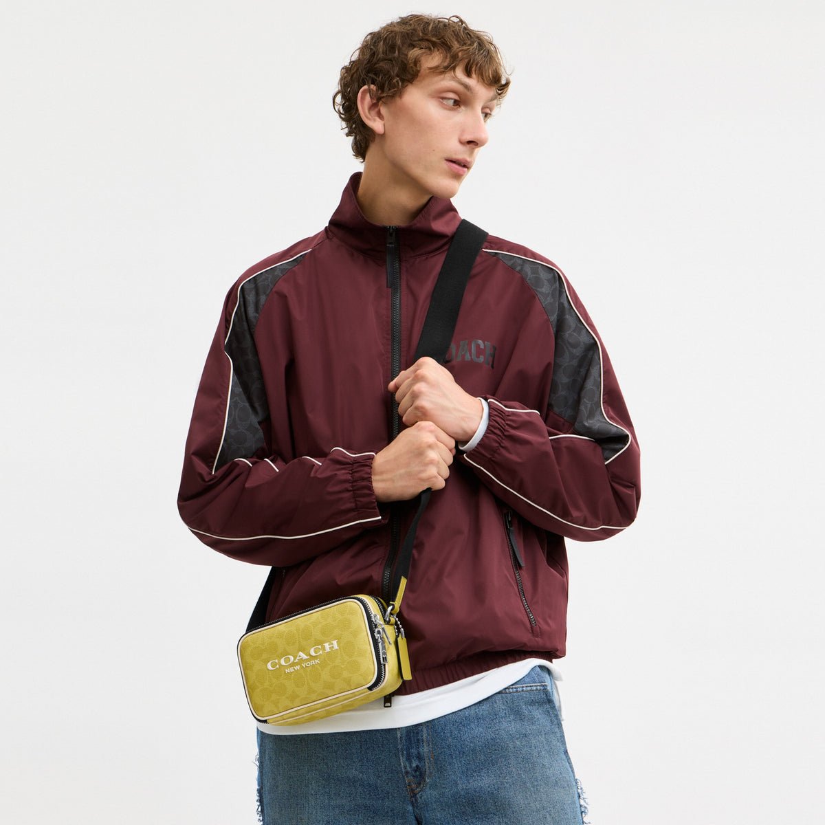 Colton Crossbody Bag 19 In Signature Canvas With Coach Graphic