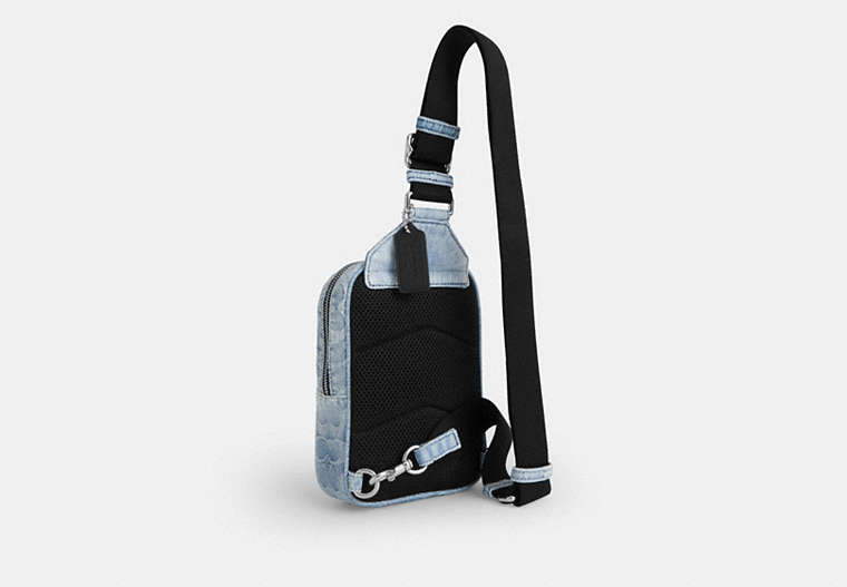 Racer Sling Pack In Loved Signature Denim