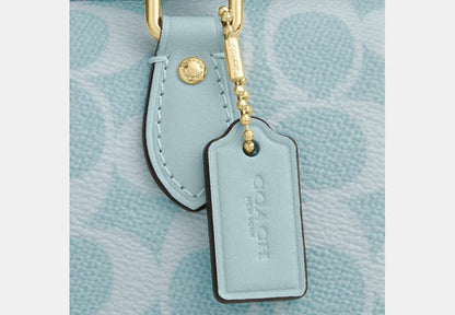 Mini Rowan Crossbody Bag In Signature Canvas