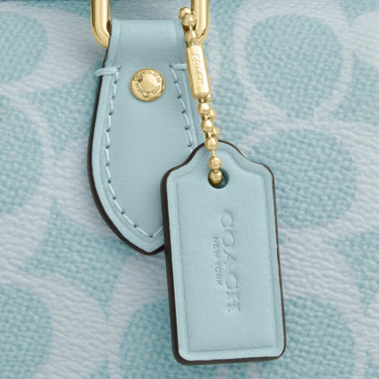 Mini Rowan Crossbody Bag In Signature Canvas