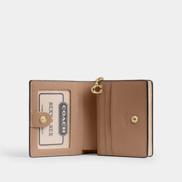 Snap Wallet With Floral Print And Charm