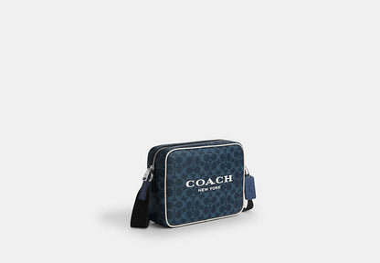 Colton Crossbody Bag 25 In Signature Canvas With Coach Graphic