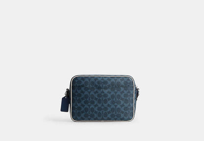 Colton Crossbody Bag 25 In Signature Canvas With Coach Graphic