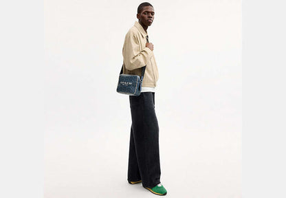 Colton Crossbody Bag 25 In Signature Canvas With Coach Graphic
