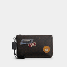 Pouch In Signature Canvas With Patches