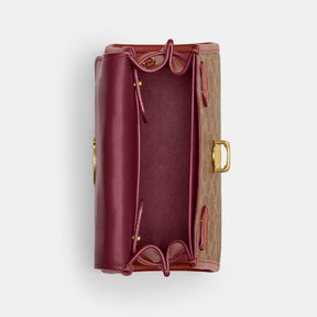 Sammy Top Handle Bag 21 In Signature Canvas