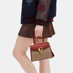 Sammy Top Handle Bag 21 In Signature Canvas