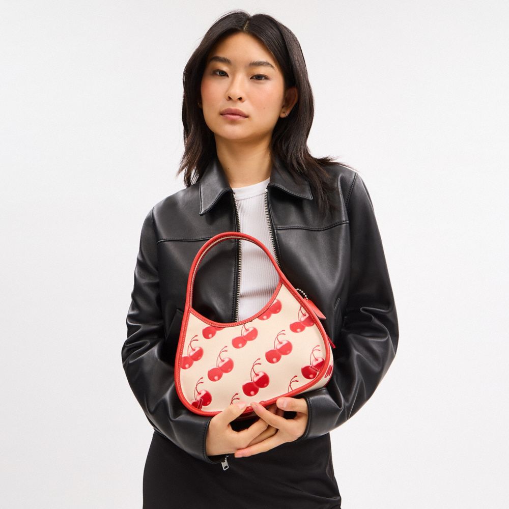 Ergo Bag In Coachtopia Leather With Cherry Print