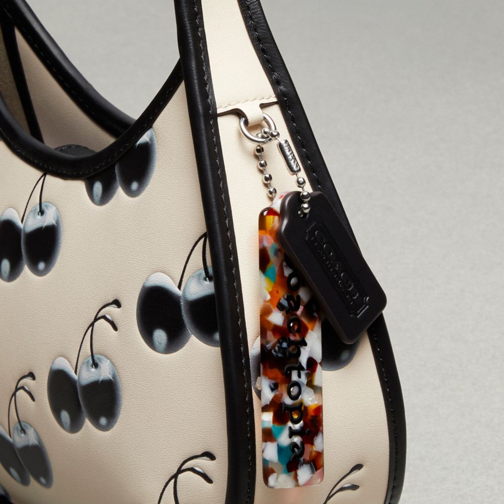 Ergo Bag In Coachtopia Leather With Cherry Print