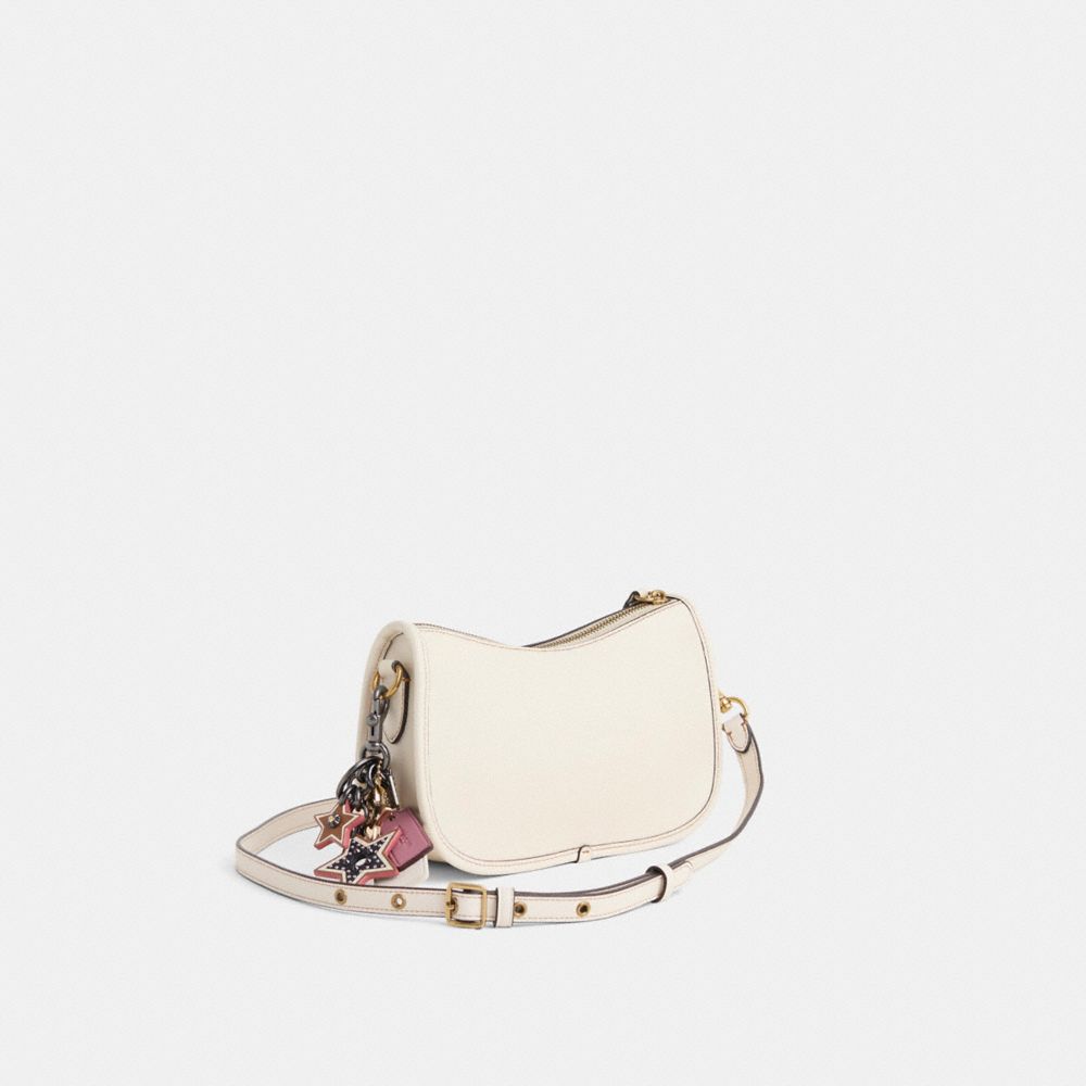 Disney X Coach Swinger Bag In Regenerative Leather With Mickey Mouse And Friends