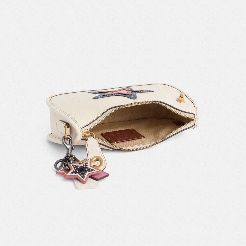 Disney X Coach Swinger Bag In Regenerative Leather With Mickey Mouse And Friends