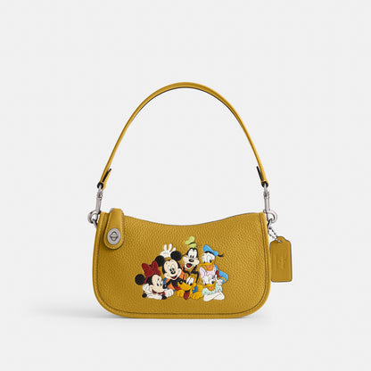 Disney X Coach Swinger Bag In Regenerative Leather With Mickey Mouse And Friends