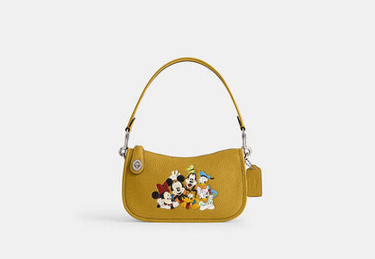 Disney X Coach Swinger Bag In Regenerative Leather With Mickey Mouse And Friends