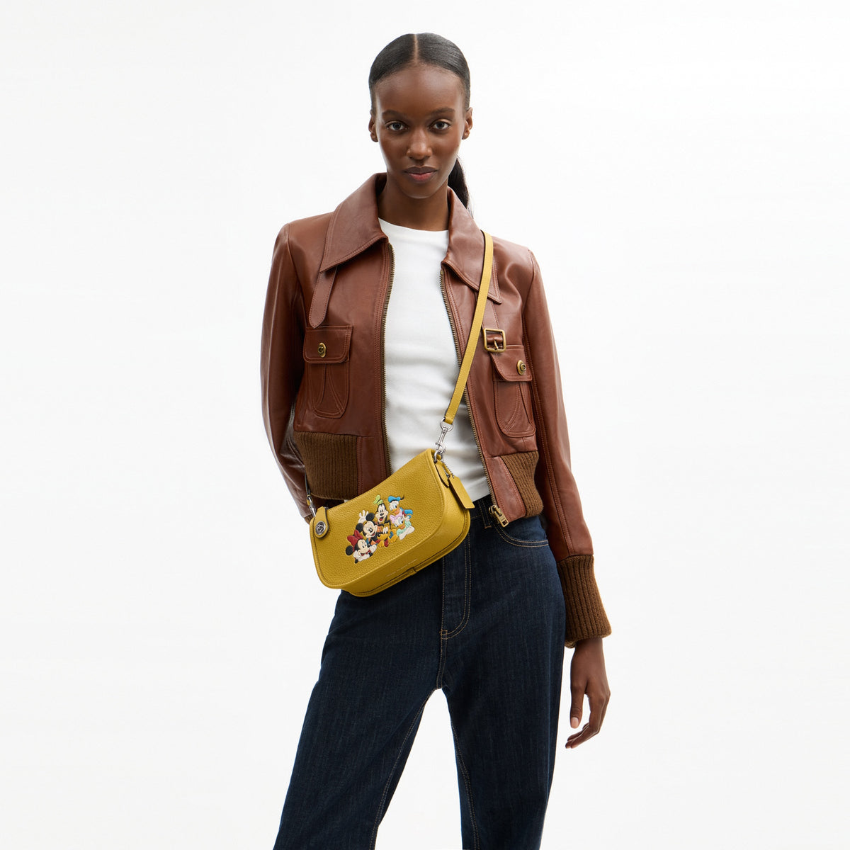 Disney X Coach Swinger Bag In Regenerative Leather With Mickey Mouse And Friends