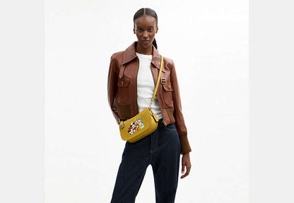Disney X Coach Swinger Bag In Regenerative Leather With Mickey Mouse And Friends