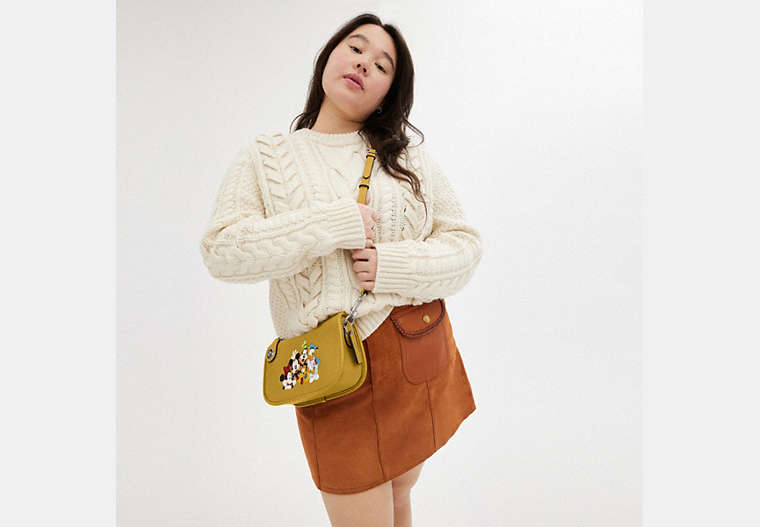 Disney X Coach Swinger Bag In Regenerative Leather With Mickey Mouse And Friends