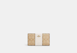 Slim Zip Wallet In Signature Canvas With Stripe