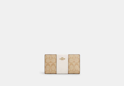 Slim Zip Wallet In Signature Canvas With Stripe