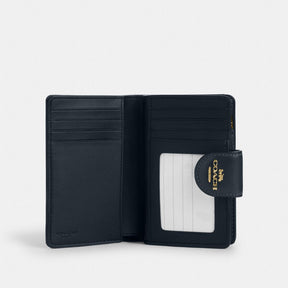 Medium Corner Zip Wallet In Signature Jacquard