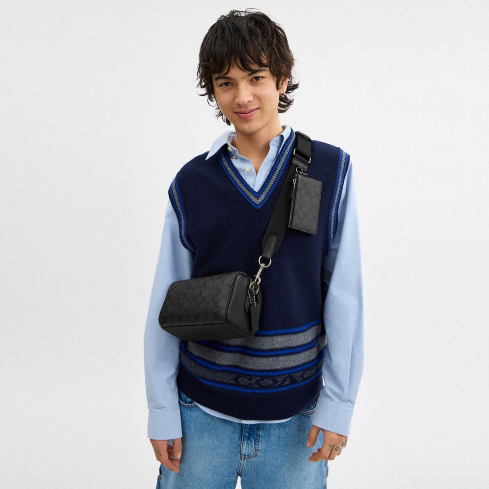 Axel Crossbody Bag In Signature Canvas