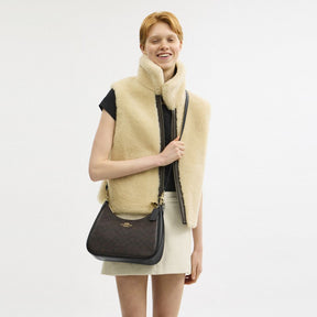 Teri Hobo Bag In Signature Canvas