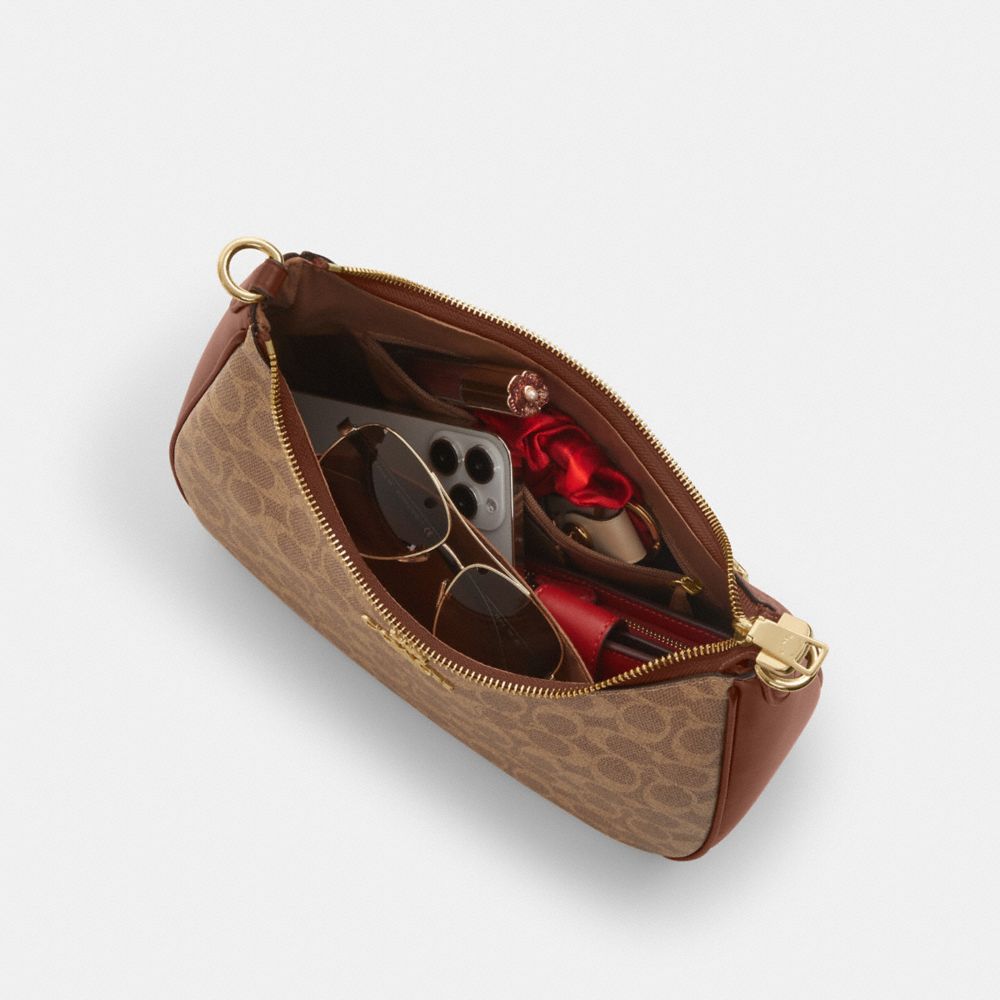 Teri Hobo Bag In Signature Canvas