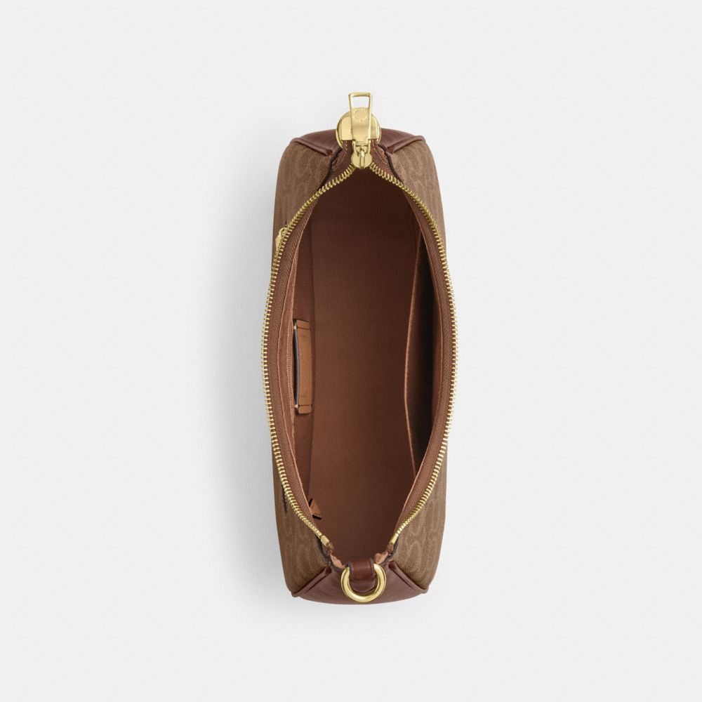 Teri Hobo Bag In Signature Canvas