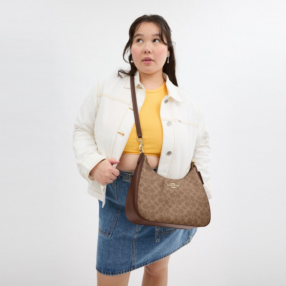 Teri Hobo Bag In Signature Canvas