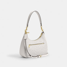 Teri Hobo Bag In Signature Canvas